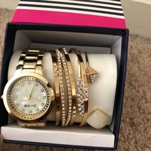 Gold watch and bracelets